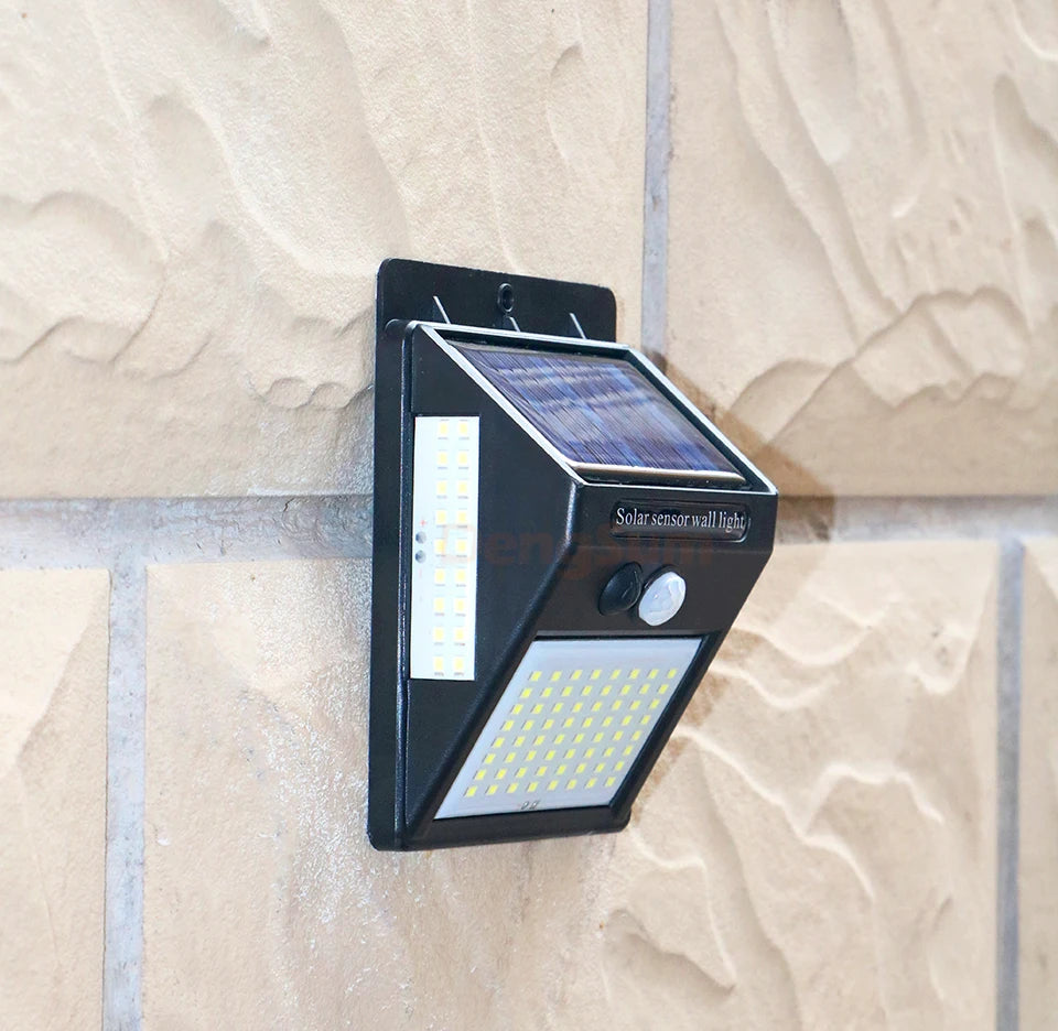 PIR Motion Sensor 100LED Sunlight control 3 sided Solar Energy Street light Yard Path Home Garden Solar Power lamp Wall Light