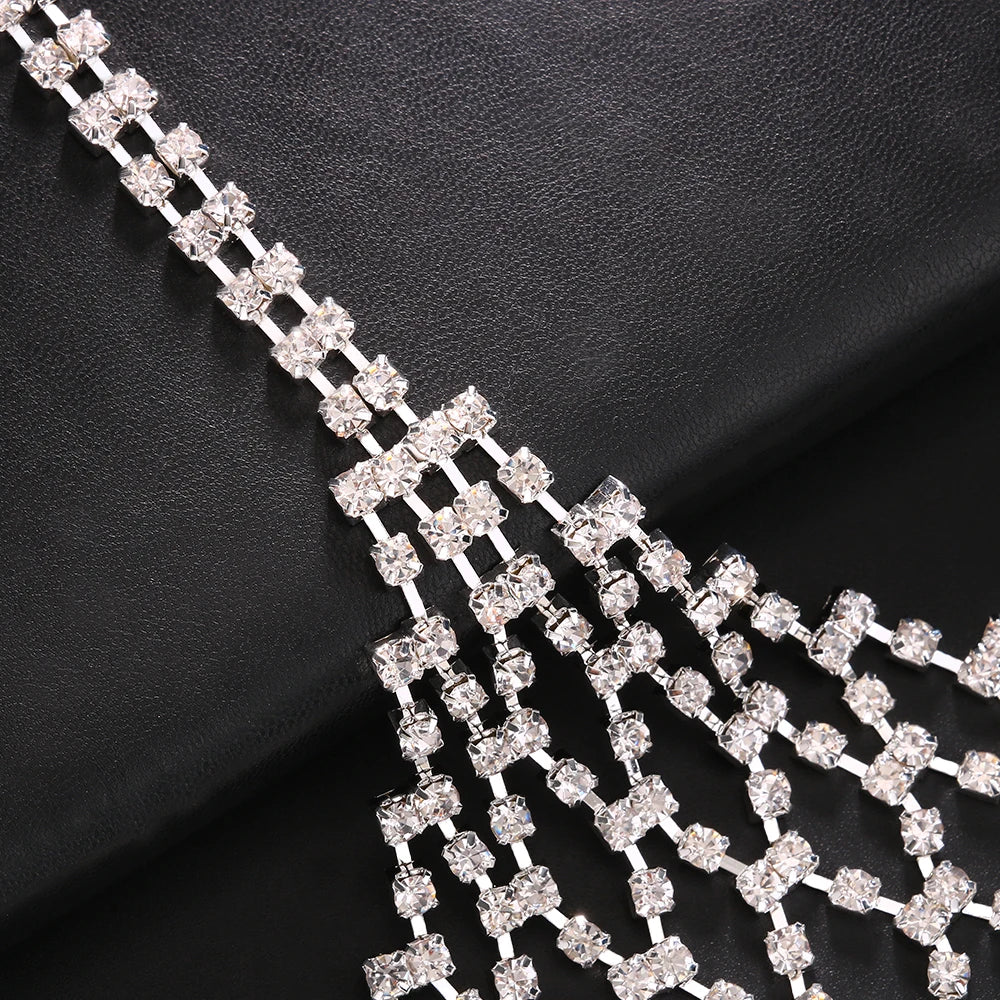 Stonefans Mesh Harness Rhinestone Tassel Bra Chain Nightclub Clothing Hollow Festival Tops Crystal Sexy Body Jewelry for Women
