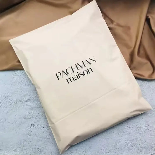 50 matte apricot pink shipping bags, suitable for clothing, parties, and gifts. Custom logos supported.