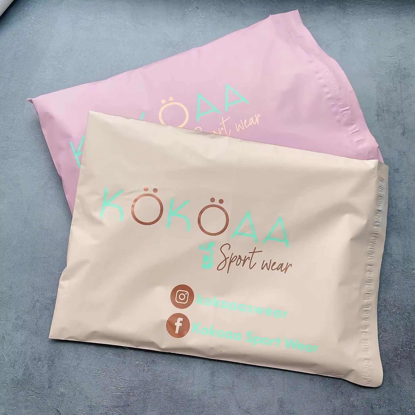 50 matte apricot pink shipping bags, suitable for clothing, parties, and gifts. Custom logos supported.